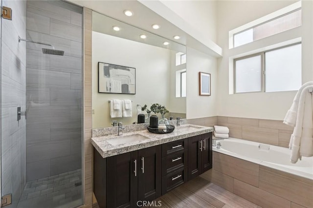 2205 Rockefeller Ln Unit B, Redondo Beach, CA 90278 - bathroom with recessed lighting, a shower stall, a garden tub, and double vanity