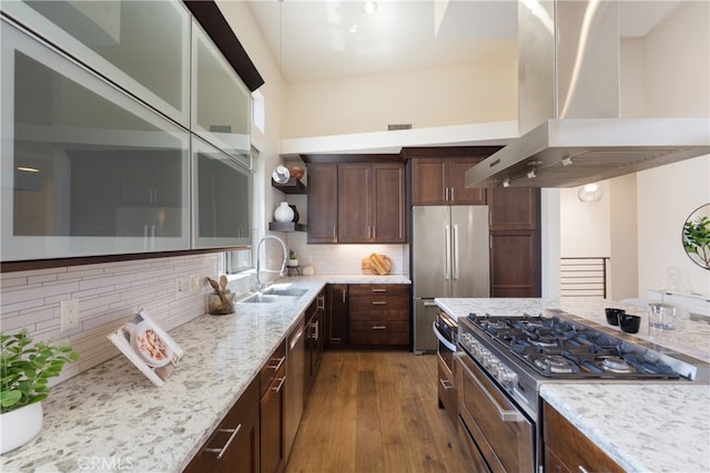 2205 Rockefeller Ln Unit B, Redondo Beach, CA 90278 - kitchen with ventilation hood, stainless steel appliances, dark wood-type flooring, light stone countertops, and dark brown cabinetry