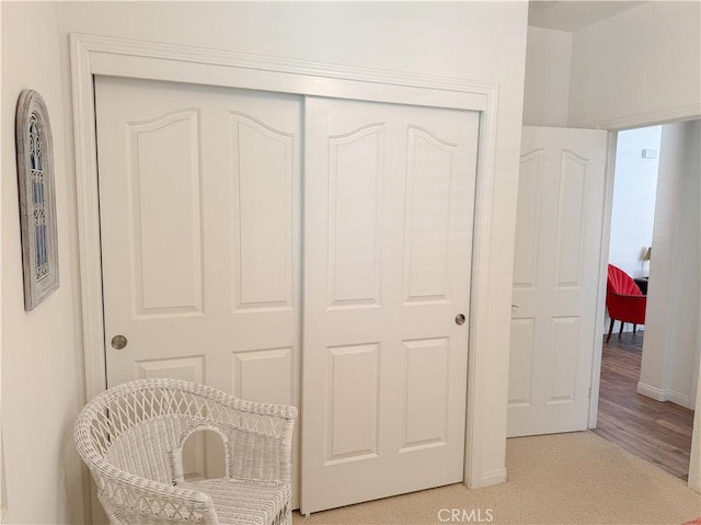 living area featuring baseboards
