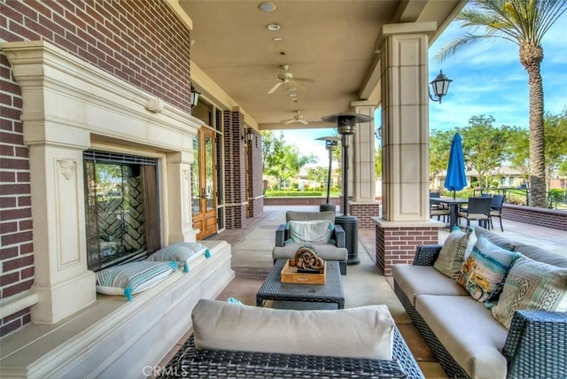view of patio with an outdoor hangout area and ceiling fan