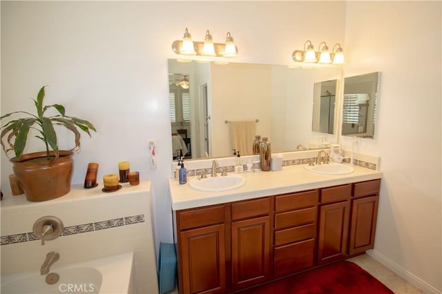 full bathroom featuring a bath and double vanity