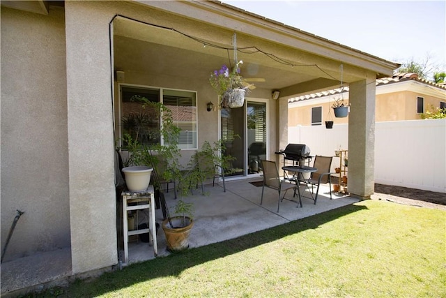 view of patio with ceiling fan