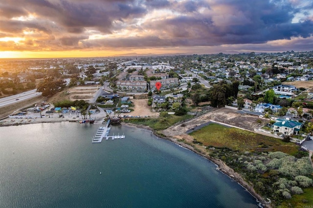 aerial overview of property's location featuring a large body of water