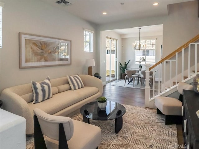 617 E Walnut Ave, Monrovia, CA 91016 - living room with a chandelier, wood finished floors, stairs, healthy amount of natural light, and recessed lighting