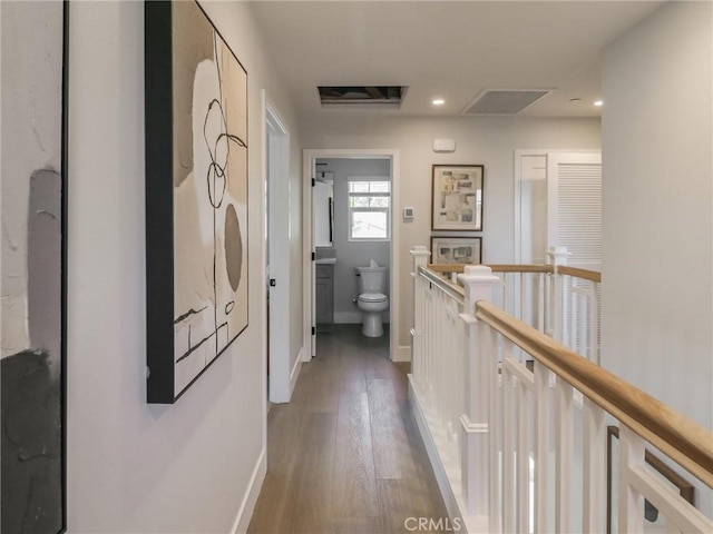 617 E Walnut Ave, Monrovia, CA 91016 - corridor with wood finished floors, baseboards, recessed lighting, and an upstairs landing
