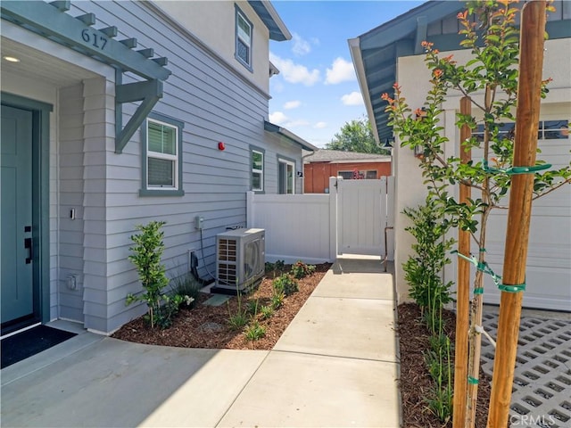 617 E Walnut Ave, Monrovia, CA 91016 - view of side of property with a cooling unit and a patio