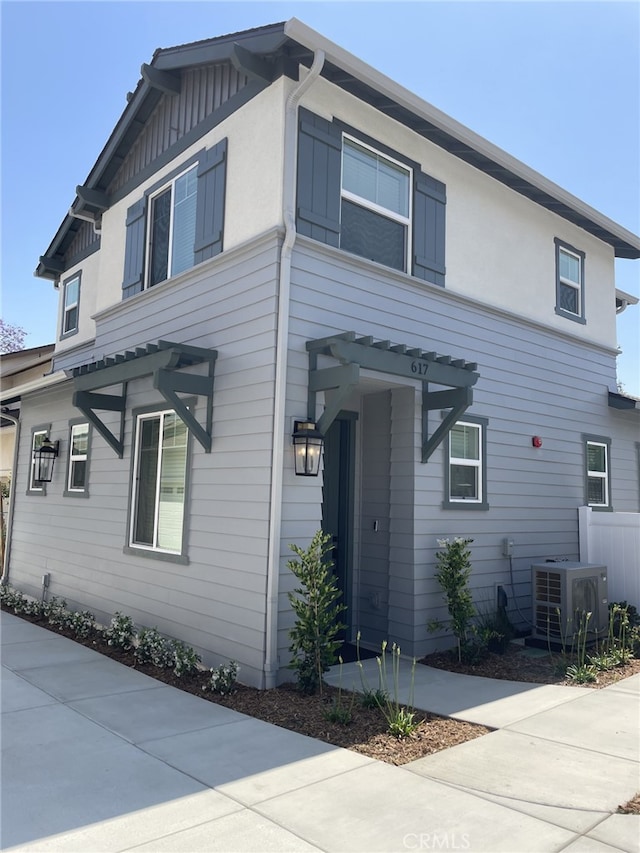 617 E Walnut Ave, Monrovia, CA 91016 - view of front facade with central AC and a pergola