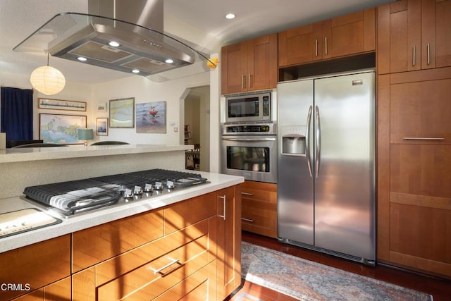 4129 Marmion Way, Los Angeles, CA 90065 - kitchen with stainless steel appliances, island range hood, brown cabinetry, light countertops, and recessed lighting