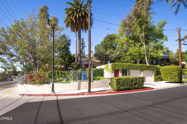 4129 Marmion Way, Los Angeles, CA 90065 - view of property hidden behind natural elements featuring driveway