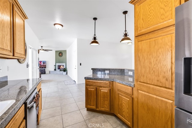 60849 Duvall Dr, Joshua Tree, CA 92252 - kitchen featuring stainless steel appliances, tile counters, a ceiling fan, pendant lighting, and light tile patterned flooring
