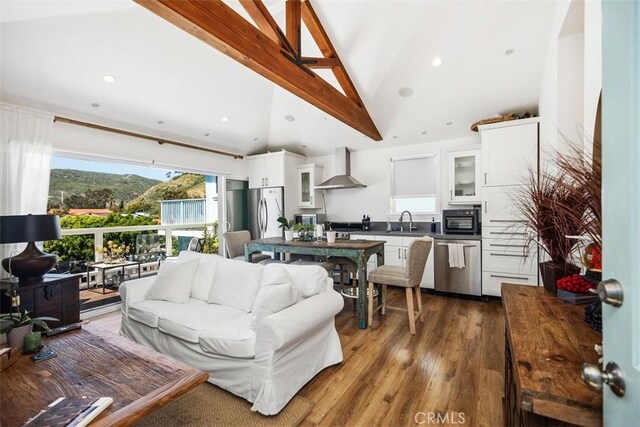 385 Mermaid, Laguna Beach, CA 92651 - living area featuring dark wood-style floors, recessed lighting, and high vaulted ceiling