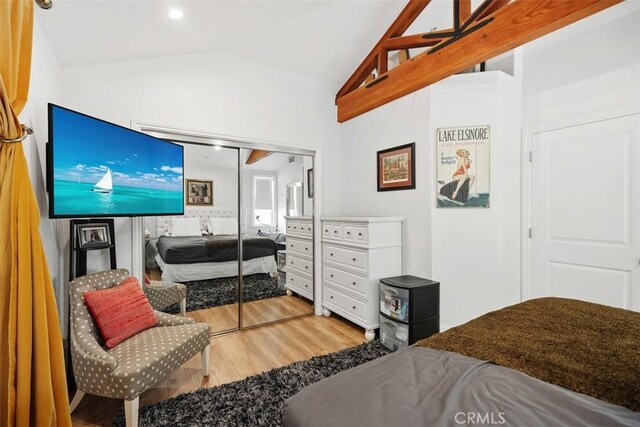 385 Mermaid, Laguna Beach, CA 92651 - bedroom featuring lofted ceiling, wood finished floors, and a closet