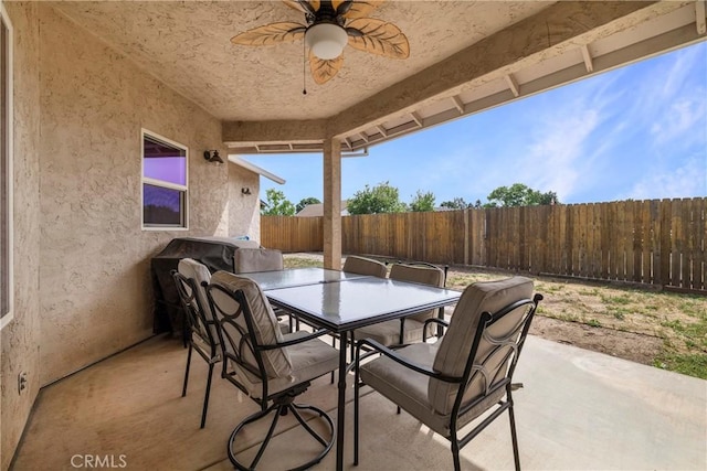 6 Vintage Ct, Chico, CA 95973 - fenced backyard with outdoor dining area, ceiling fan, a patio area, and area for grilling