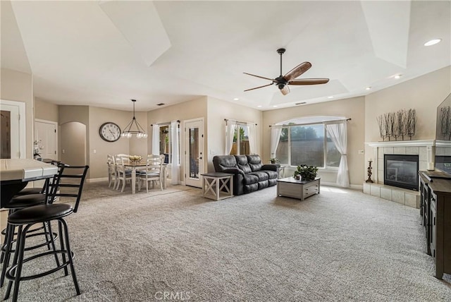 6 Vintage Ct, Chico, CA 95973 - living room featuring carpet flooring, ceiling fan, a tiled fireplace, recessed lighting, and baseboards
