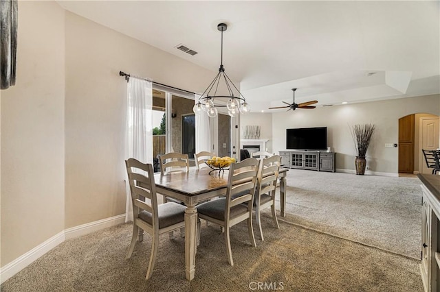 6 Vintage Ct, Chico, CA 95973 - dining space with carpet floors, arched walkways, ceiling fan, and baseboards