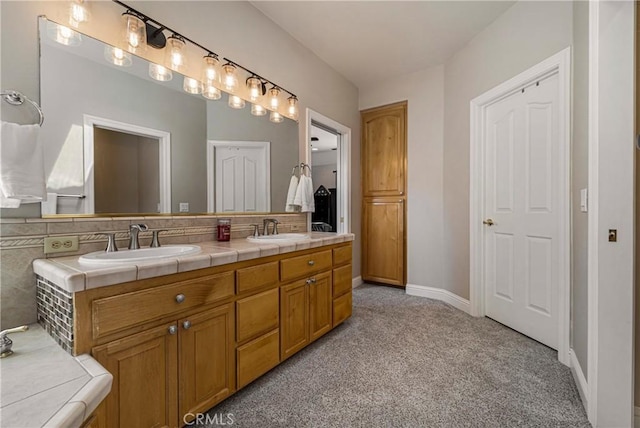 6 Vintage Ct, Chico, CA 95973 - bathroom featuring carpet floors, double vanity, and baseboards
