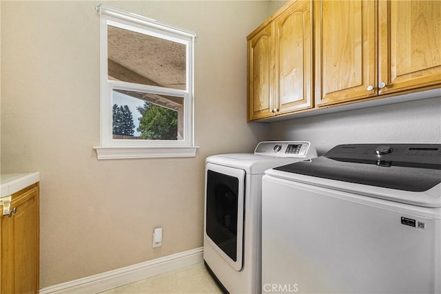 6 Vintage Ct, Chico, CA 95973 - laundry room featuring washing machine and clothes dryer and cabinet space