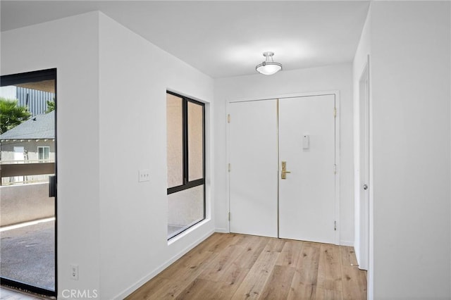 4542 Willis Ave Unit 107, Sherman Oaks, CA 91403 - foyer entrance featuring wood-type flooring and baseboards