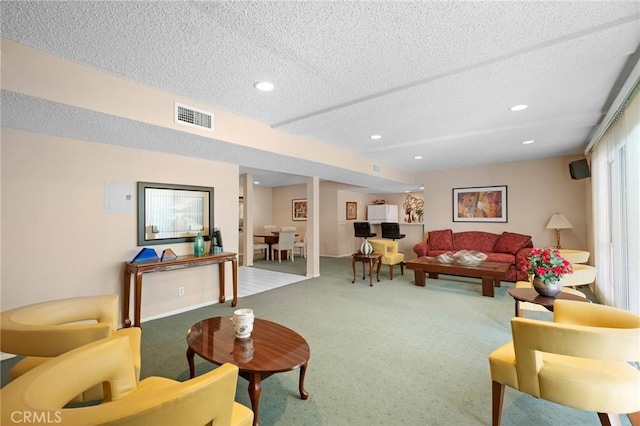 4542 Willis Ave Unit 107, Sherman Oaks, CA 91403 - living room with a textured ceiling, carpet flooring, and recessed lighting