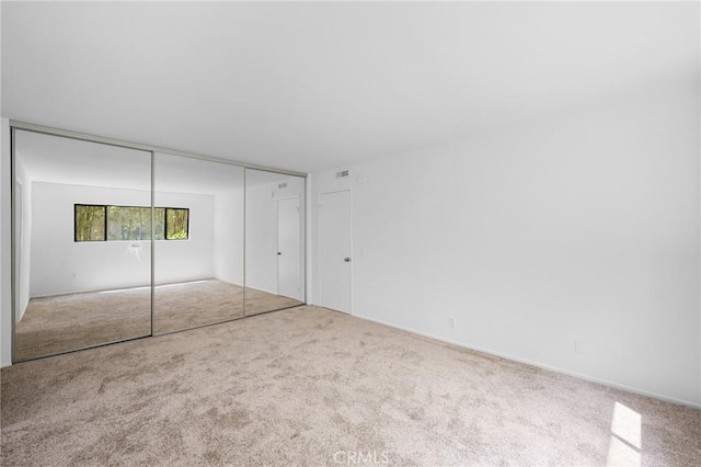 4542 Willis Ave Unit 107, Sherman Oaks, CA 91403 - unfurnished bedroom featuring carpet floors and a closet