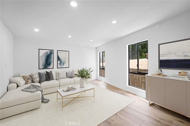 4542 Willis Ave Unit 107, Sherman Oaks, CA 91403 - living room with recessed lighting and wood finished floors