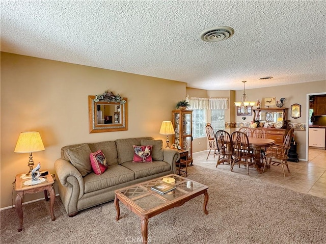 7605 Okanagan Ct, Bakersfield, CA 93309 - living room with a chandelier, a textured ceiling, and light carpet