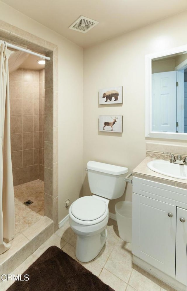 385 Spruce Dr, Lake Arrowhead, CA 92352 - full bathroom featuring tile patterned flooring, a tile shower, and vanity