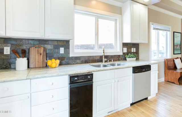 385 Spruce Dr, Lake Arrowhead, CA 92352 - kitchen featuring stainless steel dishwasher, white cabinetry, light wood-style flooring, backsplash, and crown molding