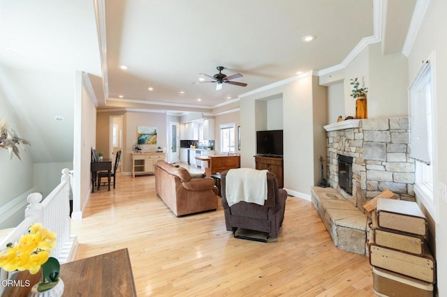 385 Spruce Dr, Lake Arrowhead, CA 92352 - living room featuring crown molding, ceiling fan, a fireplace, light wood-style flooring, and recessed lighting
