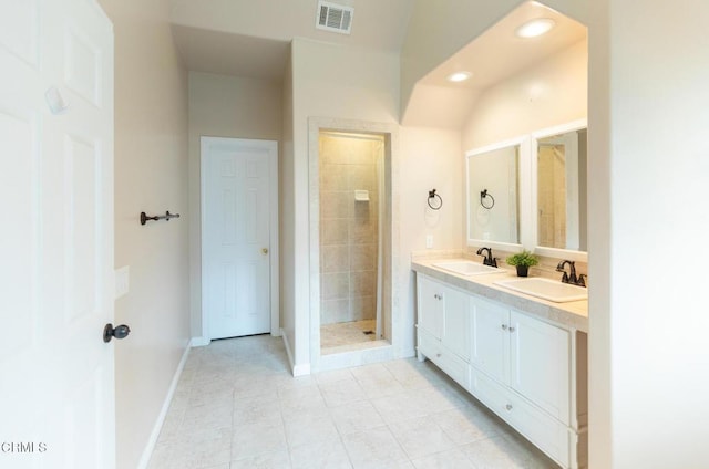 385 Spruce Dr, Lake Arrowhead, CA 92352 - full bath with double vanity, tile patterned floors, recessed lighting, and a shower stall