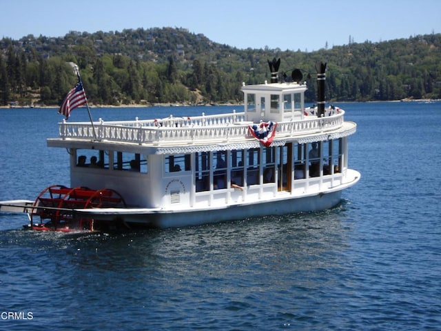 385 Spruce Dr, Lake Arrowhead, CA 92352 - dock area featuring a view of trees and a water view