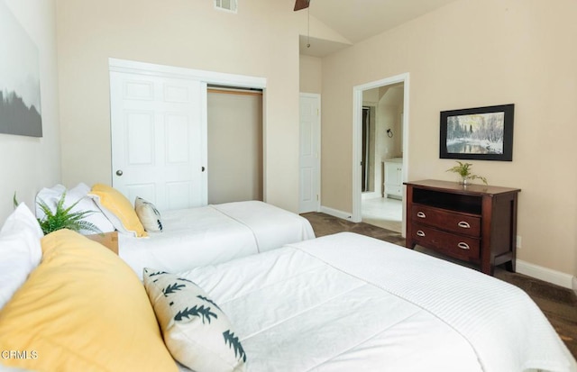 385 Spruce Dr, Lake Arrowhead, CA 92352 - bedroom with a closet, dark colored carpet, and vaulted ceiling