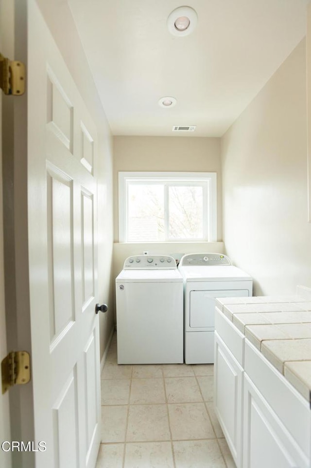 385 Spruce Dr, Lake Arrowhead, CA 92352 - washroom with washer and clothes dryer and cabinet space