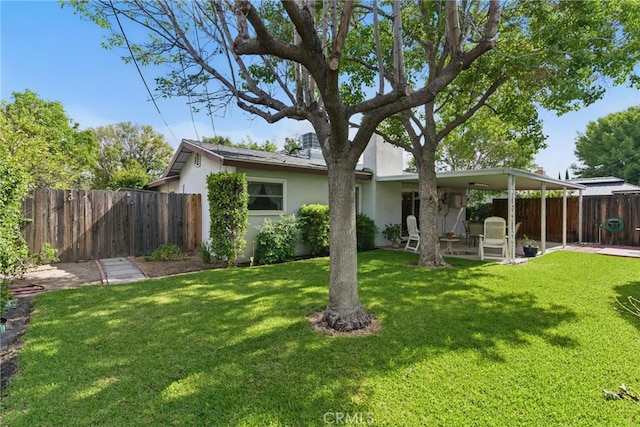 16520 Simonds St, Granada Hills, CA 91344 - back of house featuring stucco siding and a patio area