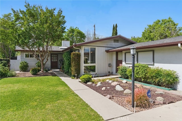 16520 Simonds St, Granada Hills, CA 91344 - view of front of property featuring a front lawn