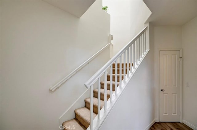 2643 Dietrich Dr, Tustin, CA 92782 - stairway with wood finished floors and baseboards