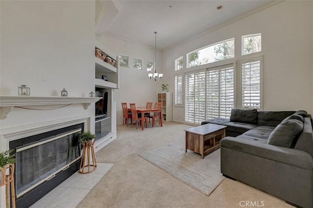 2643 Dietrich Dr, Tustin, CA 92782 - carpeted living room featuring a fireplace with flush hearth, a chandelier, and a high ceiling