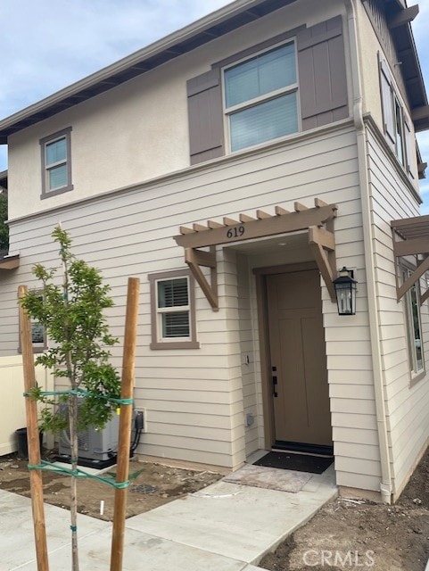 619 E Walnut, Monrovia, CA 91016 - view of exterior entry featuring central air condition unit