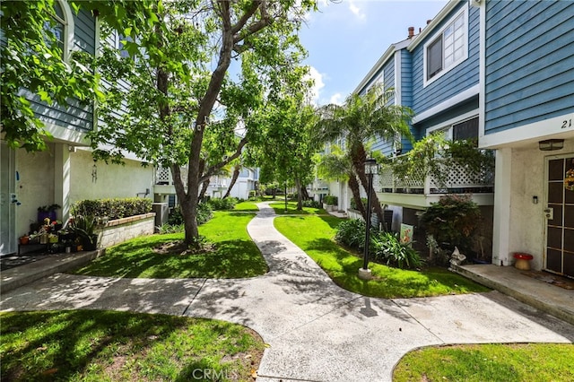 21814 Belshire Ave Unit 2, Hawaiian Gardens, CA 90716 - view of community with a lawn