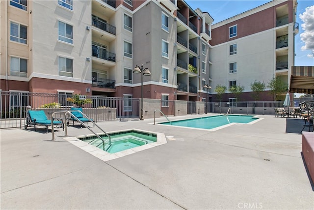 3750 Santa Rosalia Dr Unit 614, Los Angeles, CA 90008 - community pool featuring a hot tub and a patio area