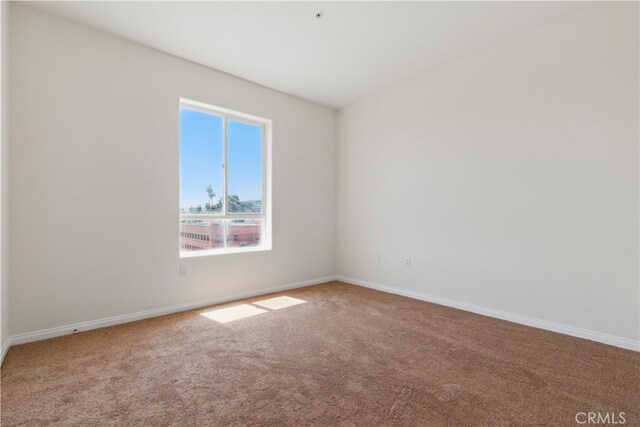 3750 Santa Rosalia Dr Unit 614, Los Angeles, CA 90008 - carpeted empty room featuring baseboards