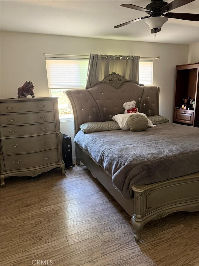 8904 Nelson Way, Escondido, CA 92026 - bedroom with wood finished floors and ceiling fan