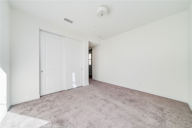 196 Episode, Irvine, CA 92618 - unfurnished bedroom featuring carpet flooring, a closet, and baseboards