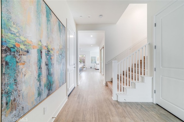 196 Episode, Irvine, CA 92618 - hall with wood finished floors, stairs, and recessed lighting
