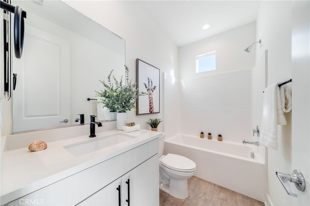 196 Episode, Irvine, CA 92618 - bathroom featuring toilet, vanity, wood finished floors, and bathing tub / shower combination