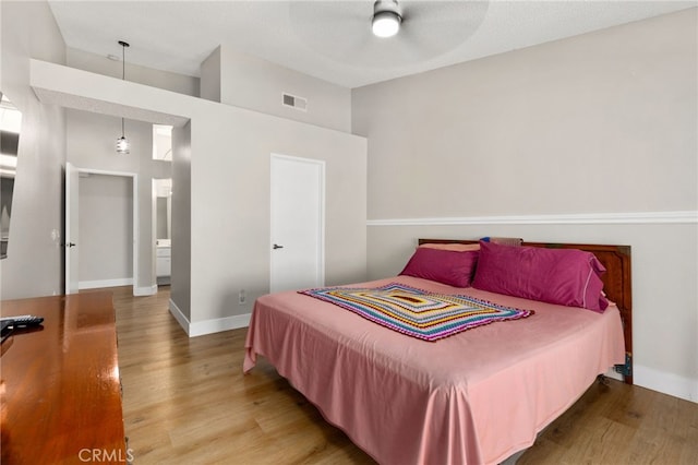 6249 Firestone Cir, Banning, CA 92220 - bedroom with wood finished floors, baseboards, and ceiling fan