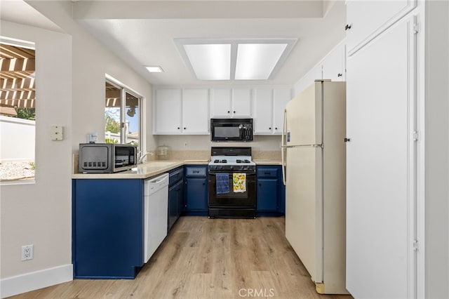 6249 Firestone Cir, Banning, CA 92220 - kitchen with white appliances, blue cabinets, light wood-style floors, and light countertops