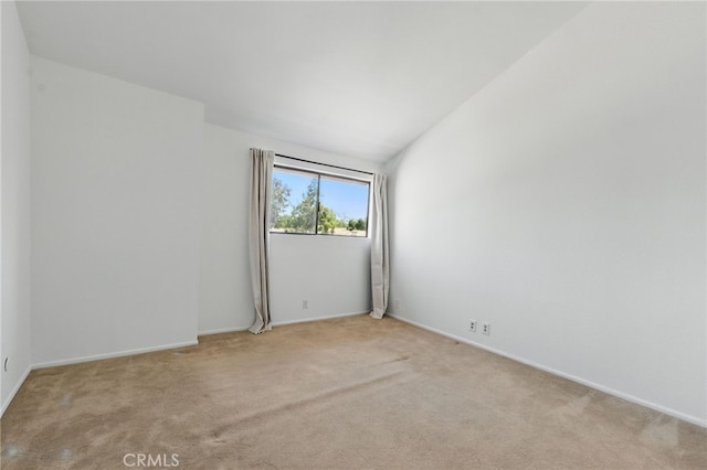 4424 Park Jazmin, Calabasas, CA 91302 - spare room with light colored carpet, vaulted ceiling, and baseboards