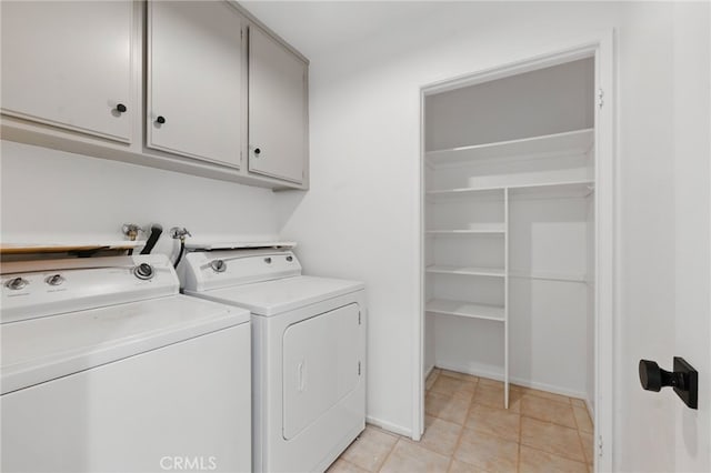 4424 Park Jazmin, Calabasas, CA 91302 - laundry room with washing machine and clothes dryer, cabinet space, light tile patterned flooring, and baseboards