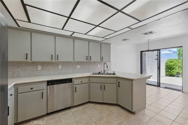 4424 Park Jazmin, Calabasas, CA 91302 - kitchen with a sink, dishwasher, a peninsula, backsplash, and light countertops